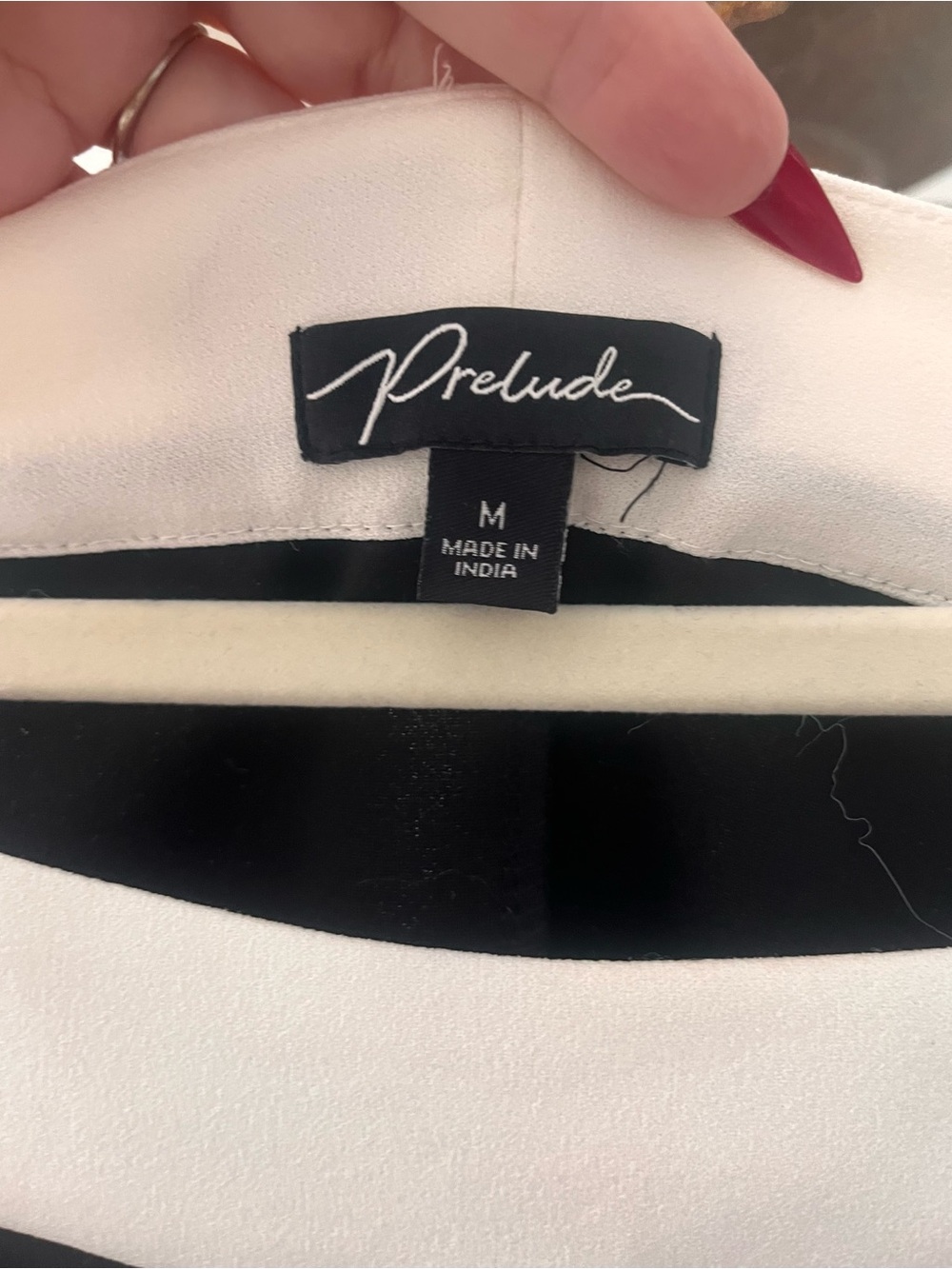 White and Black Women’s Top - Elegant Colorblock Design